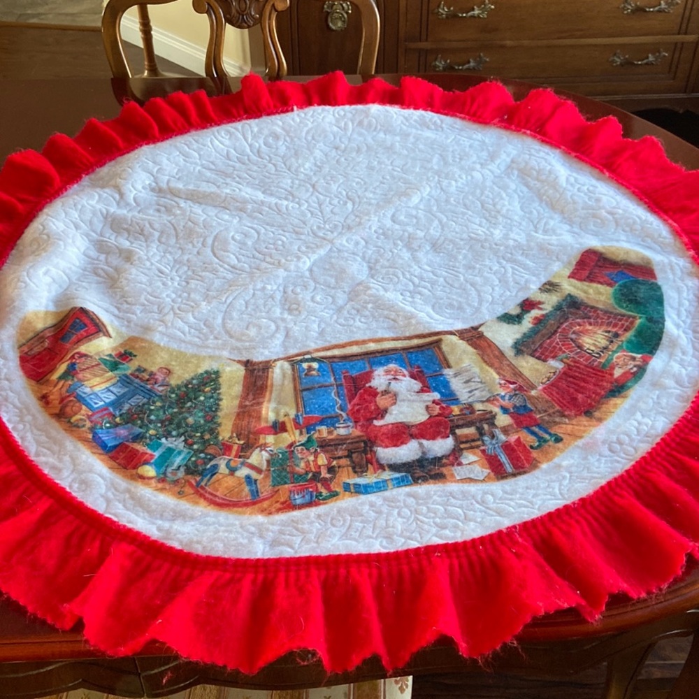 Excellent used condition- Santa’s workshop tree skirt